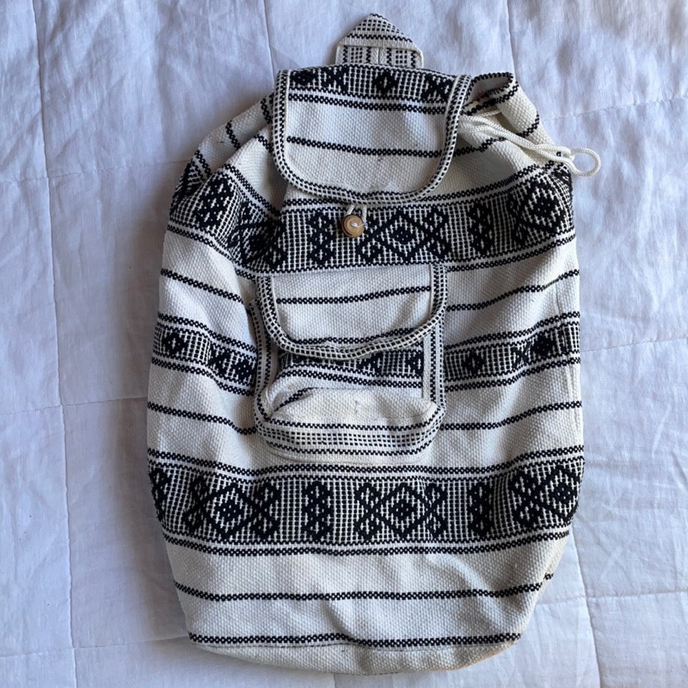 Black and white woven backpack